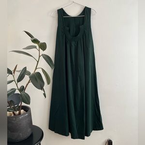 Dark green midi flared dress with elaborated back detail